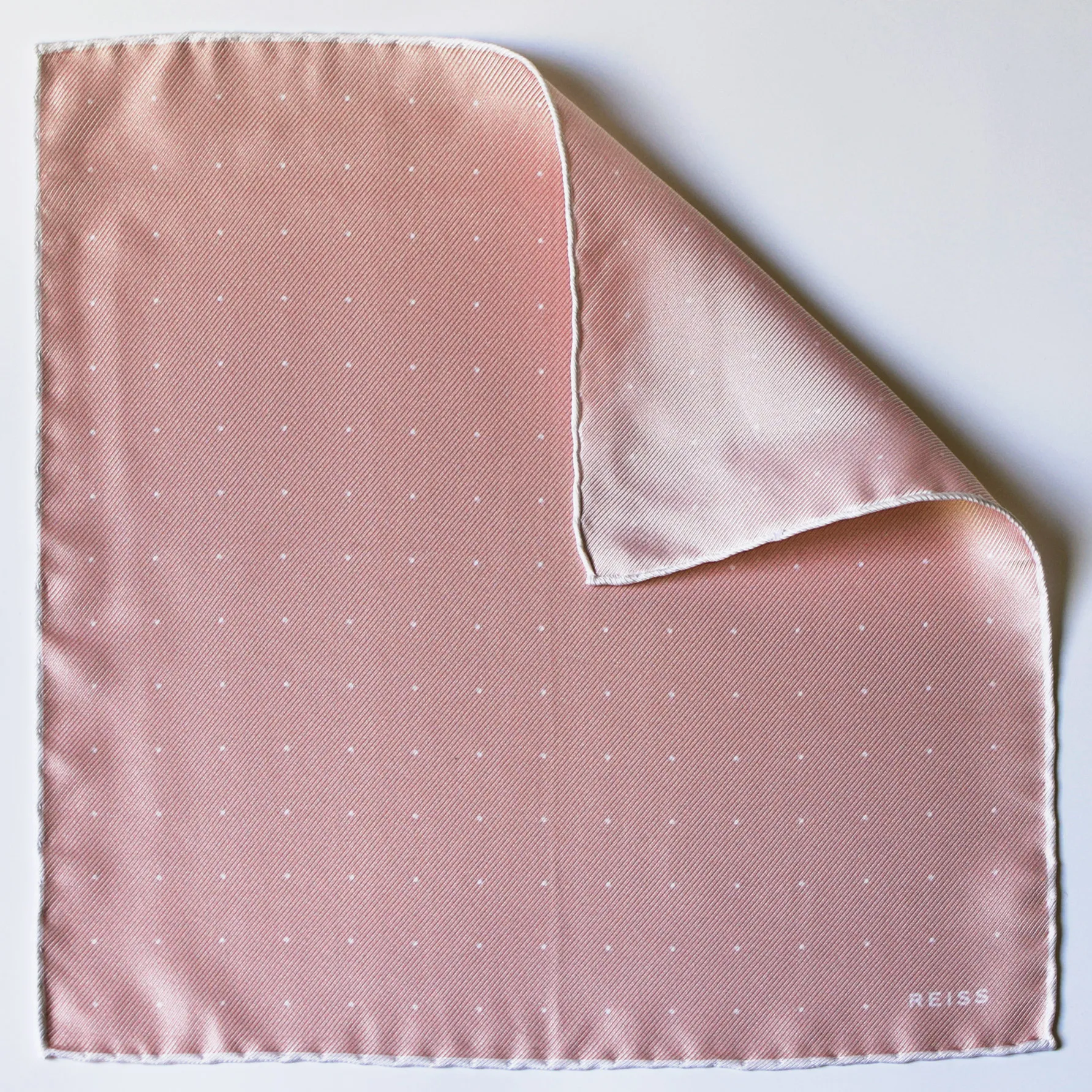 Reiss pink polka dot pocket square corner