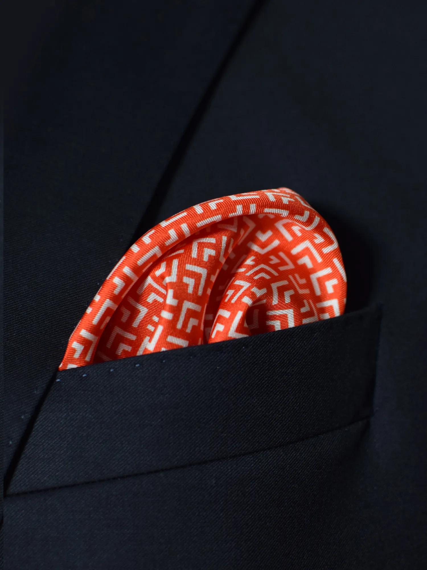 pochette a motifs géométrique orange